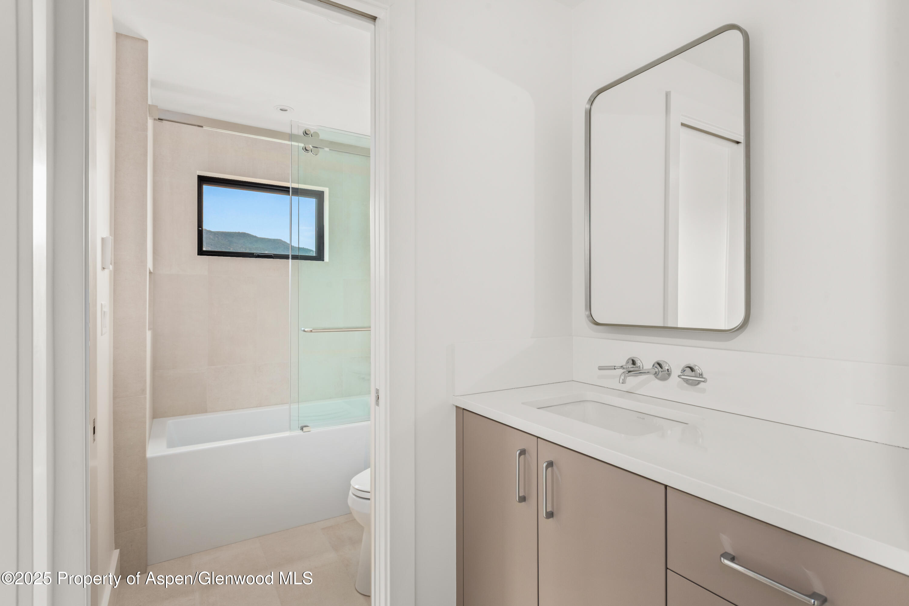 357 Stotts Mill Road Basalt, CO 81621 - Photo 24 of 29 a bathroom with a sink and a mirror