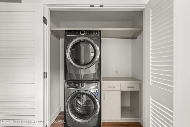 a utility room with dryer and washer