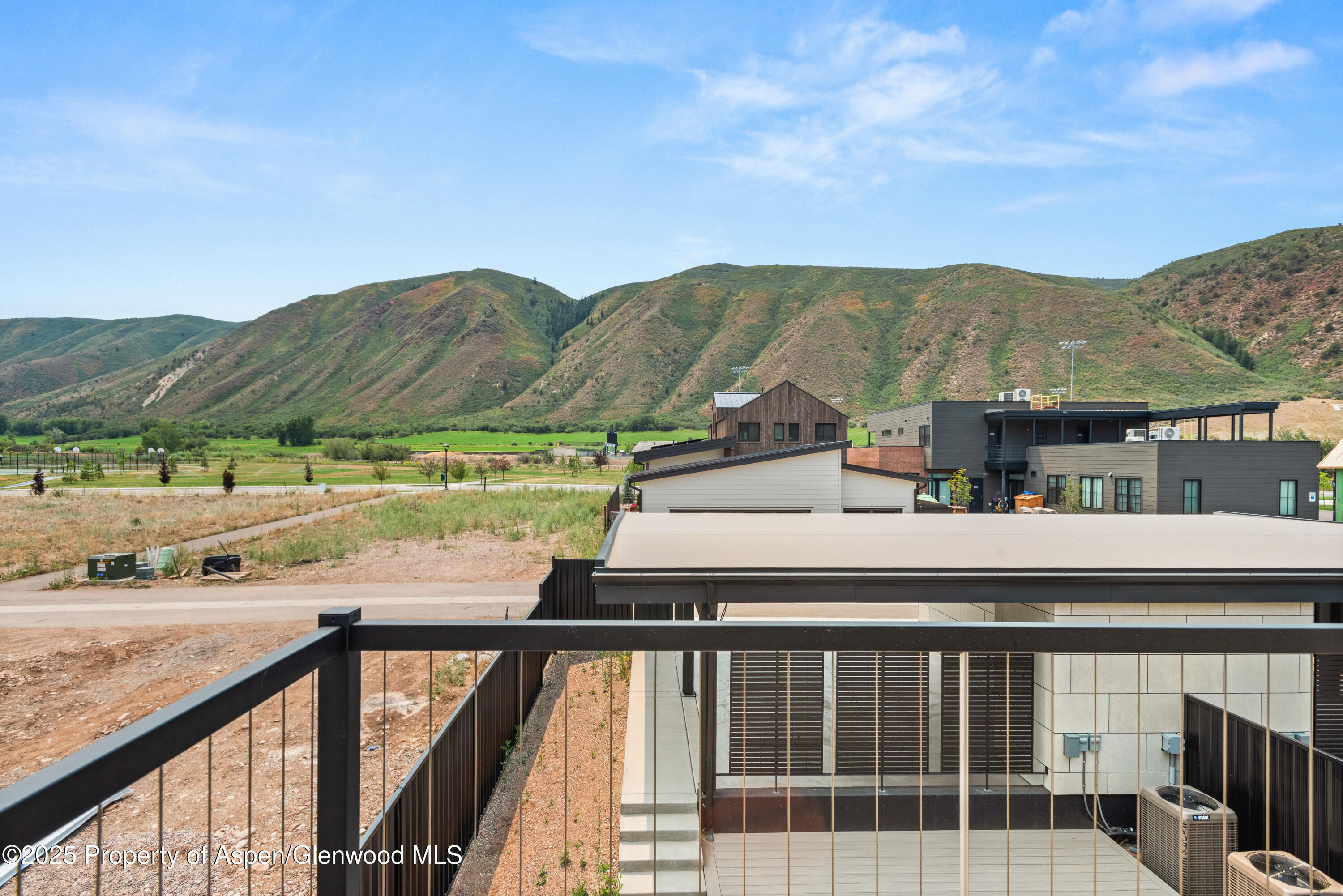357 Stotts Mill Road Basalt, CO 81621 - Photo 26 of 29 a view of a balcony with an outdoor space and seating