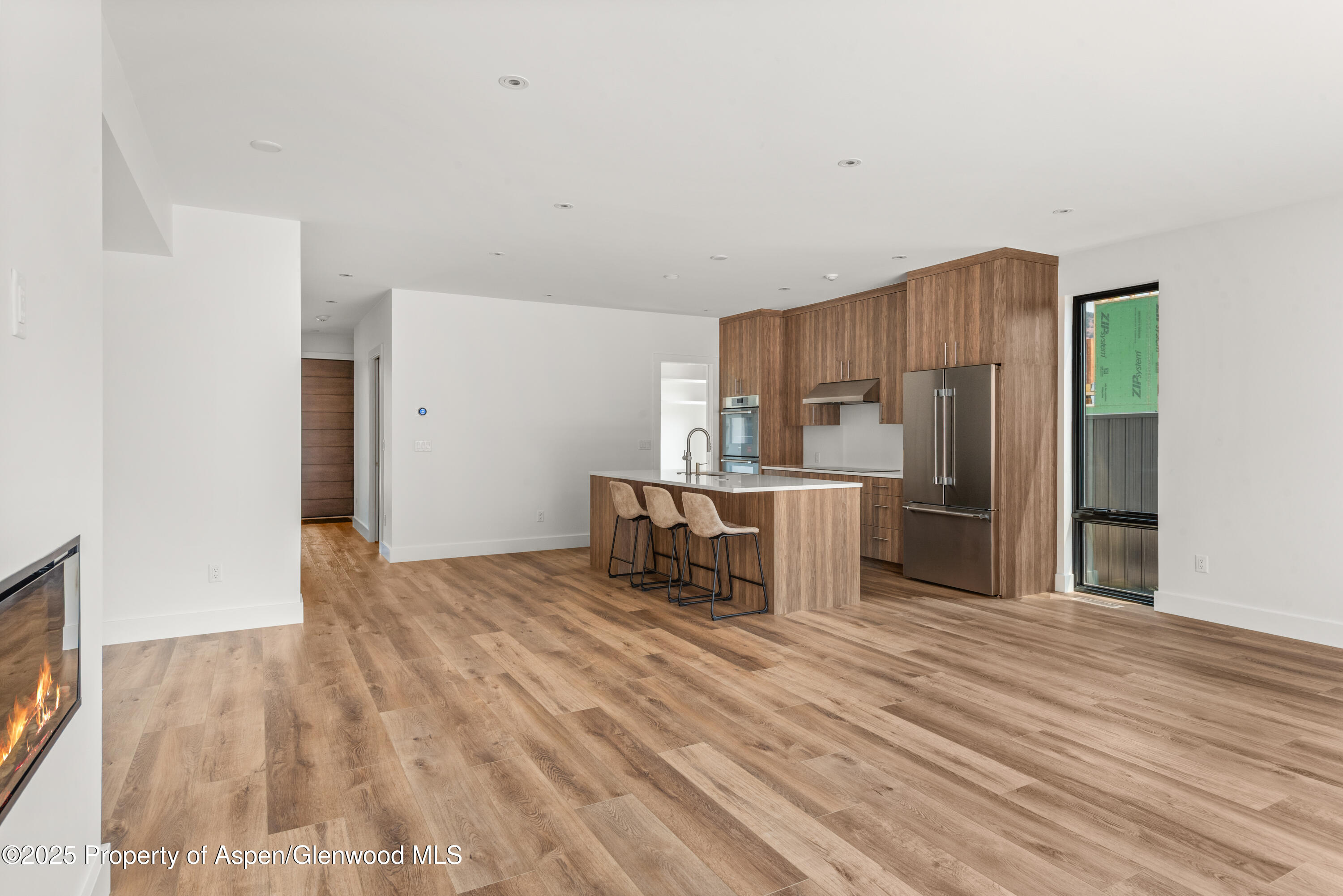 357 Stotts Mill Road Basalt, CO 81621 - Photo 6 of 29 a kitchen with stainless steel appliances a refrigerator and a stove top oven