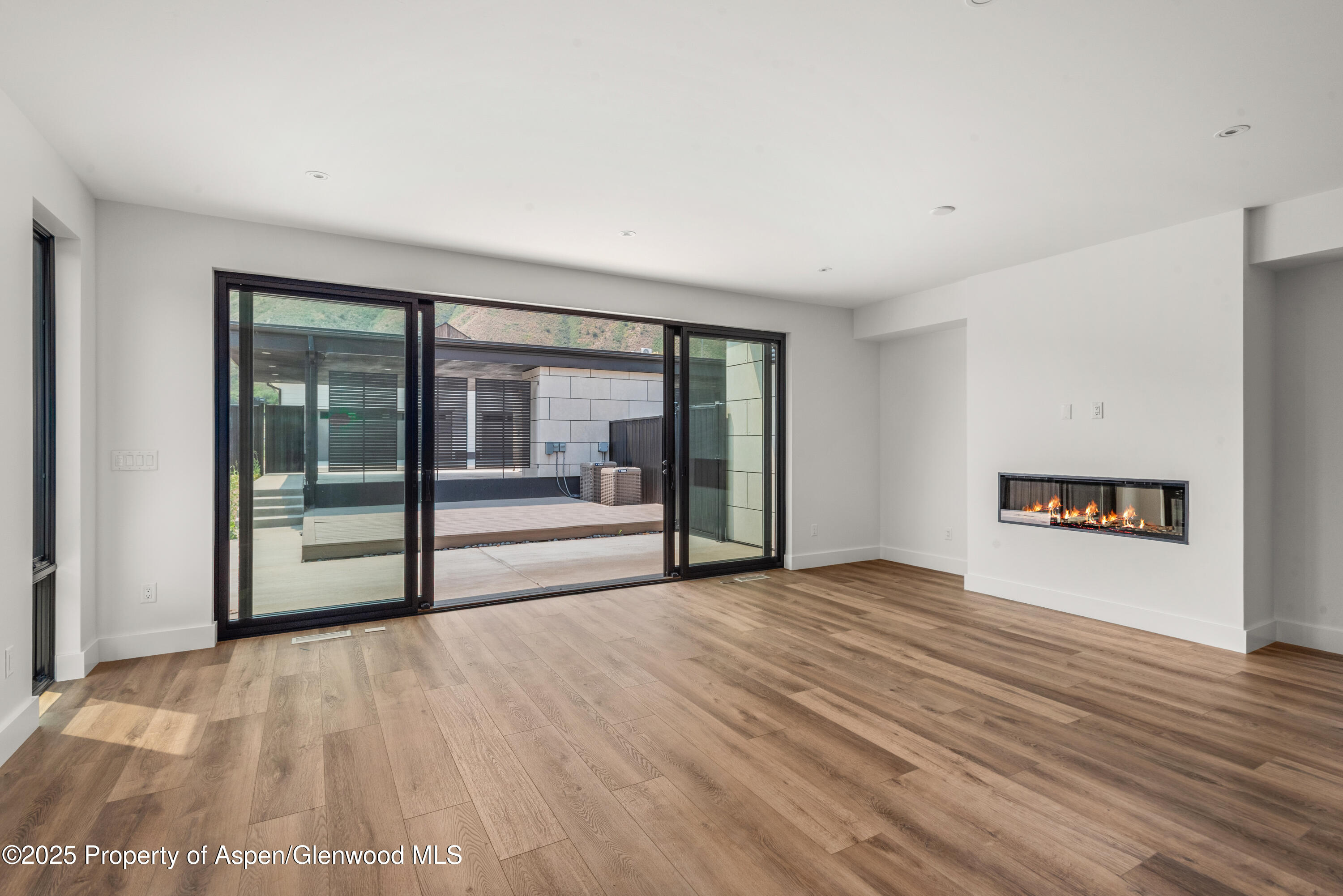 357 Stotts Mill Road Basalt, CO 81621 - Photo 9 of 29 a view of an empty room with glass door
