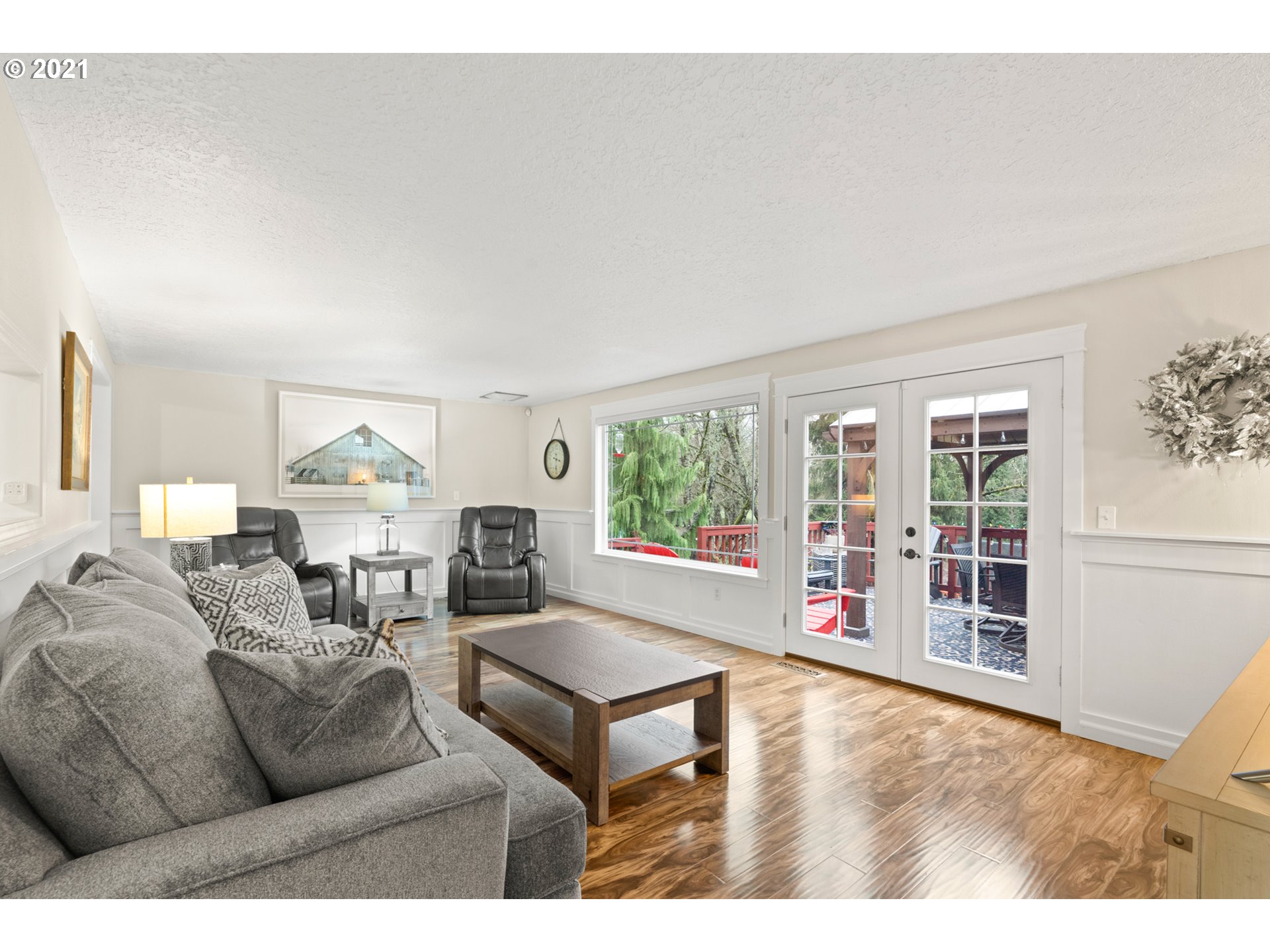 716 Northeast Evans Road Corbett, OR 97019 - Photo 16 of 32 a living room with furniture and a large window
