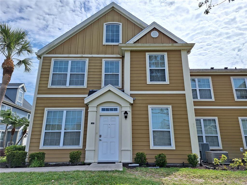 5550 Rosehill Road, Unit 103 Sarasota, FL 34233 - Photo 1 of 28 a front view of a house with garden