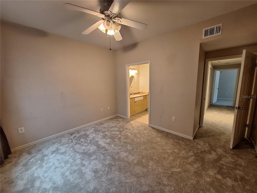 5550 Rosehill Road, Unit 103 Sarasota, FL 34233 - Photo 11 of 28 wooden floor in an empty room