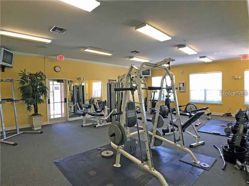 5550 Rosehill Road, Unit 103 Sarasota, FL 34233 - Photo 24 of 28 a view of a room with gym equipment