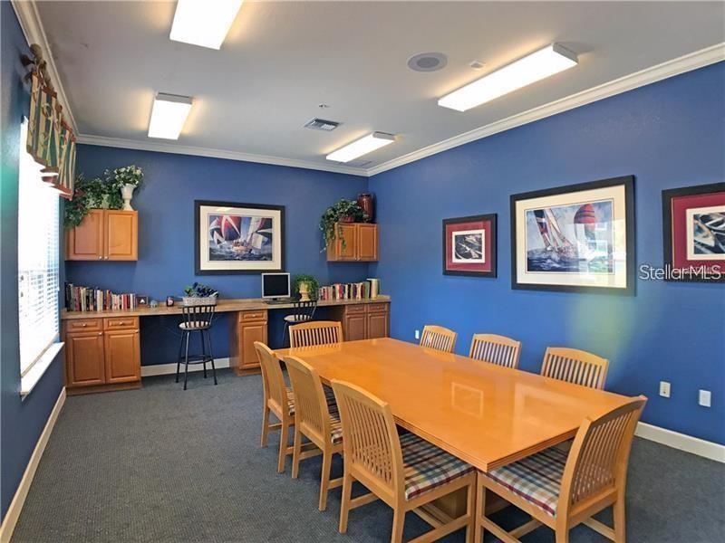 5550 Rosehill Road, Unit 103 Sarasota, FL 34233 - Photo 27 of 28 a view of a dining room with furniture