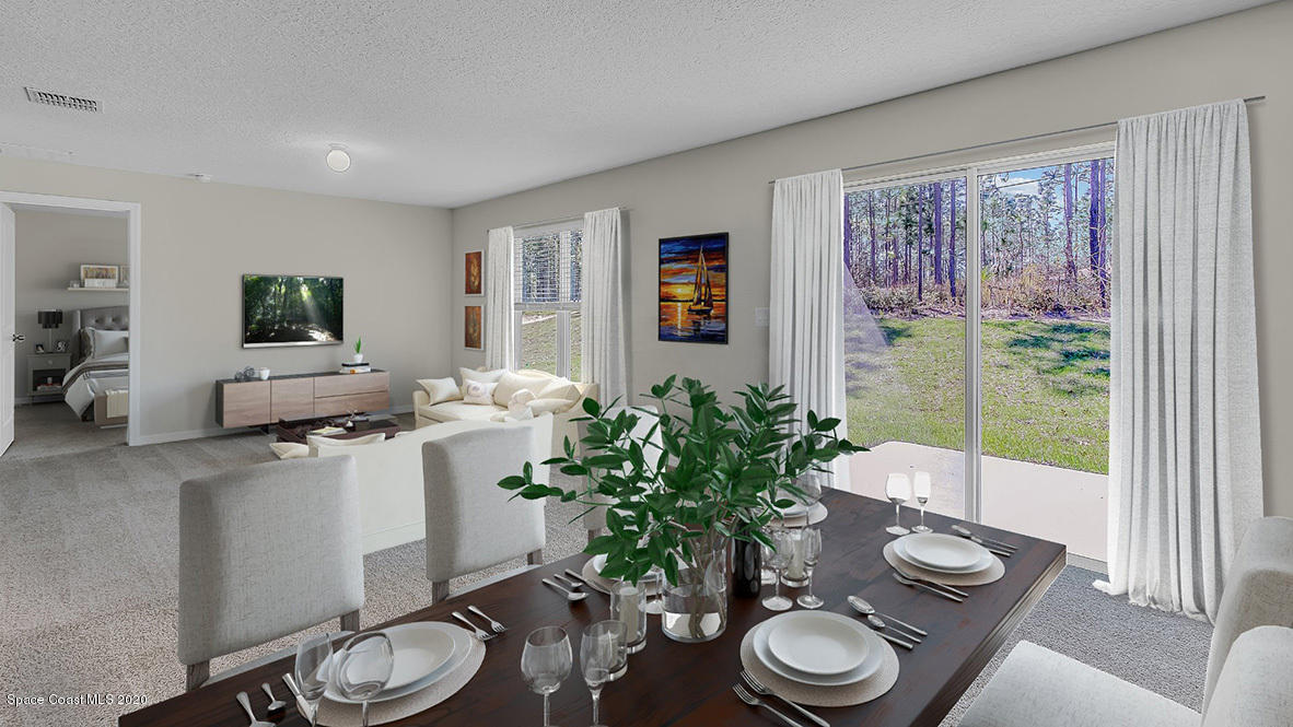 1712 Saxton Road Cocoa, FL 32926 - Photo 3 of 27 Freeport_03_Dining_into_Living