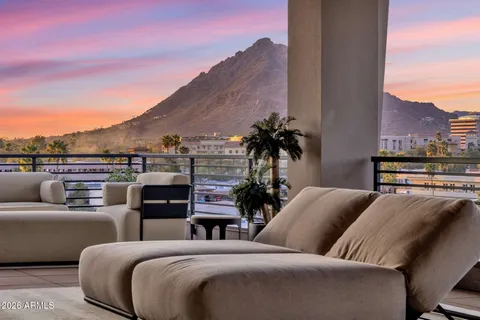 a view of a terrace with furniture