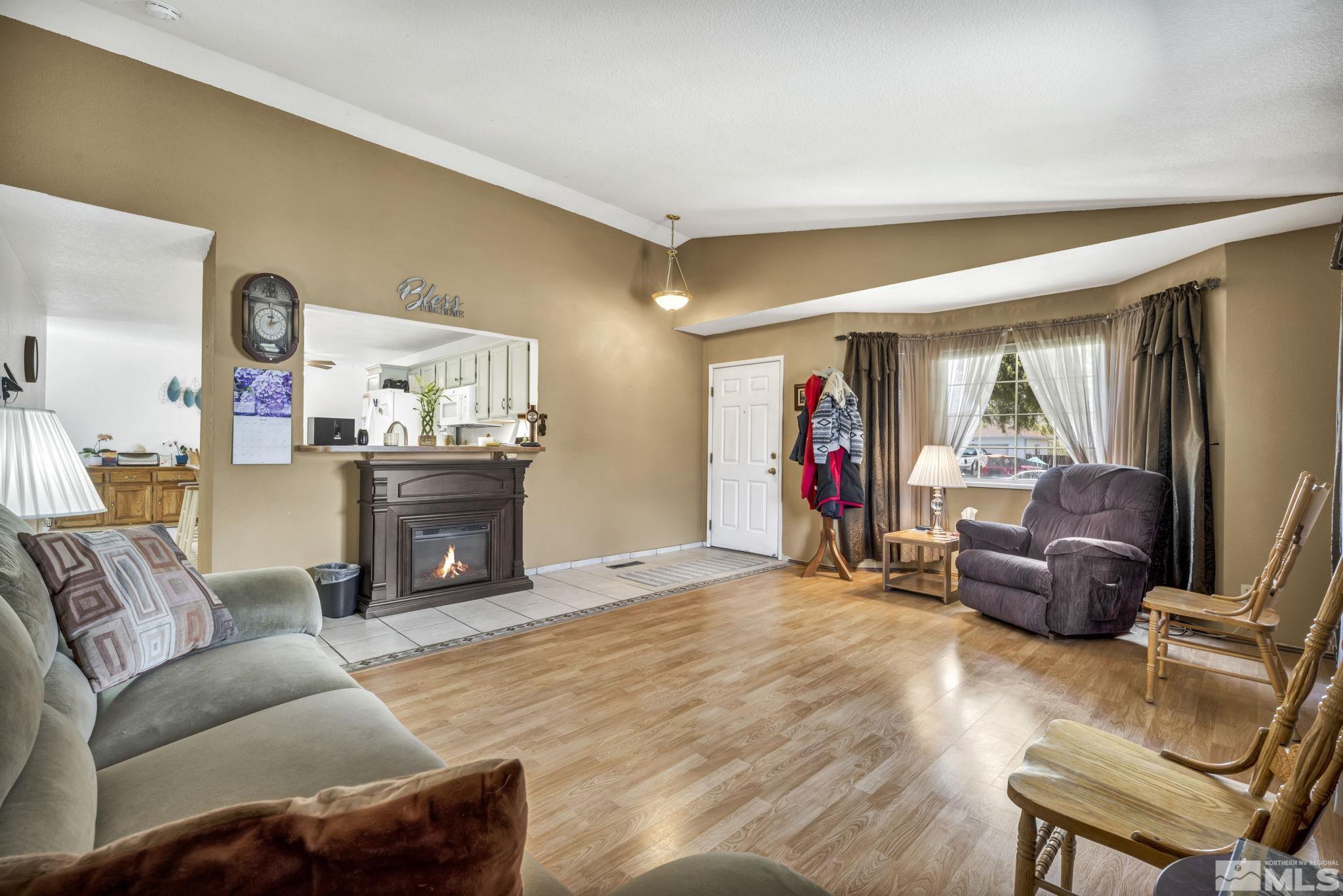17575 Blackbird Drive Reno, NV 89508 - Photo 16 of 29 a living room with furniture and a flat screen tv