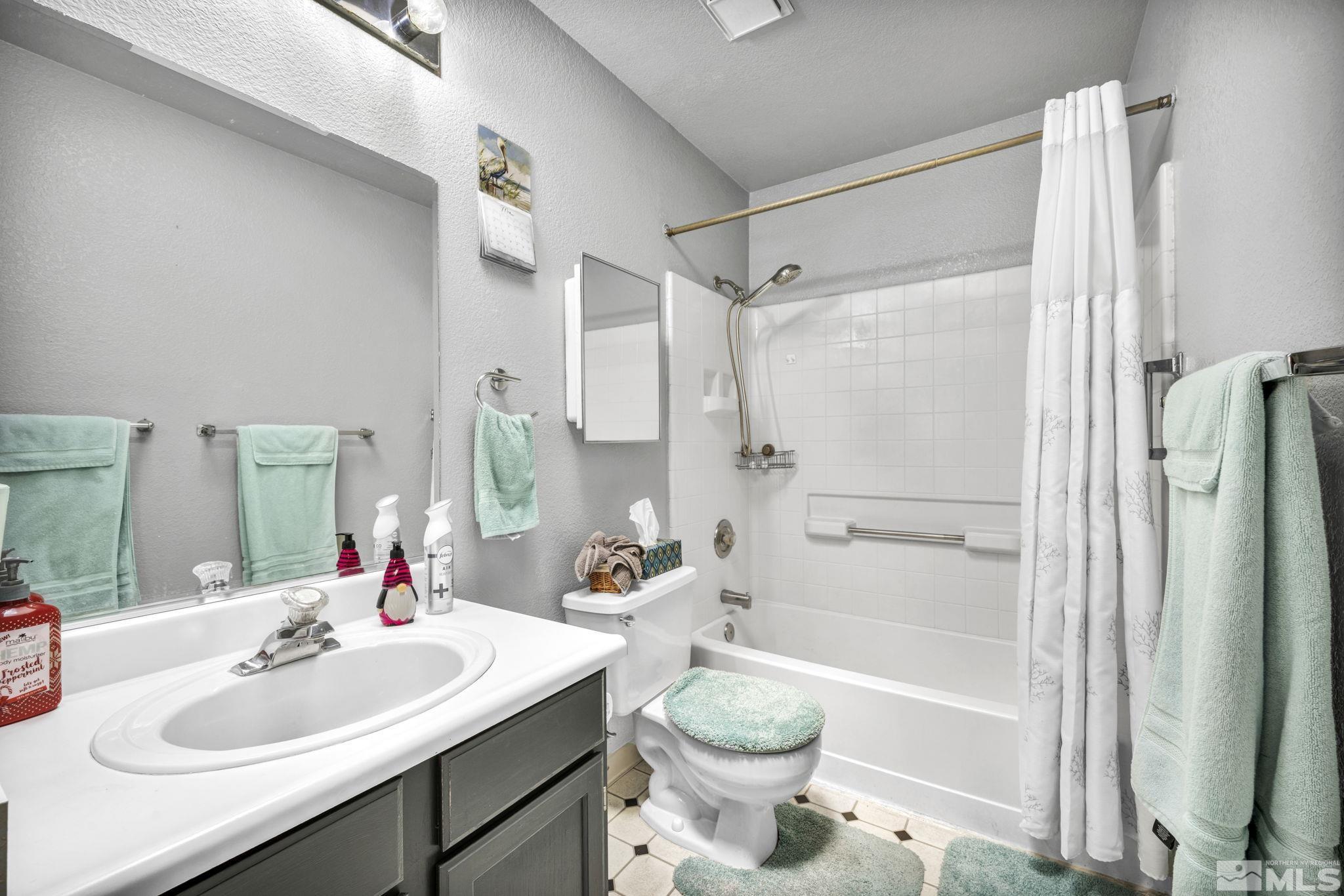 17575 Blackbird Drive Reno, NV 89508 - Photo 20 of 29 a bathroom with a sink toilet and shower
