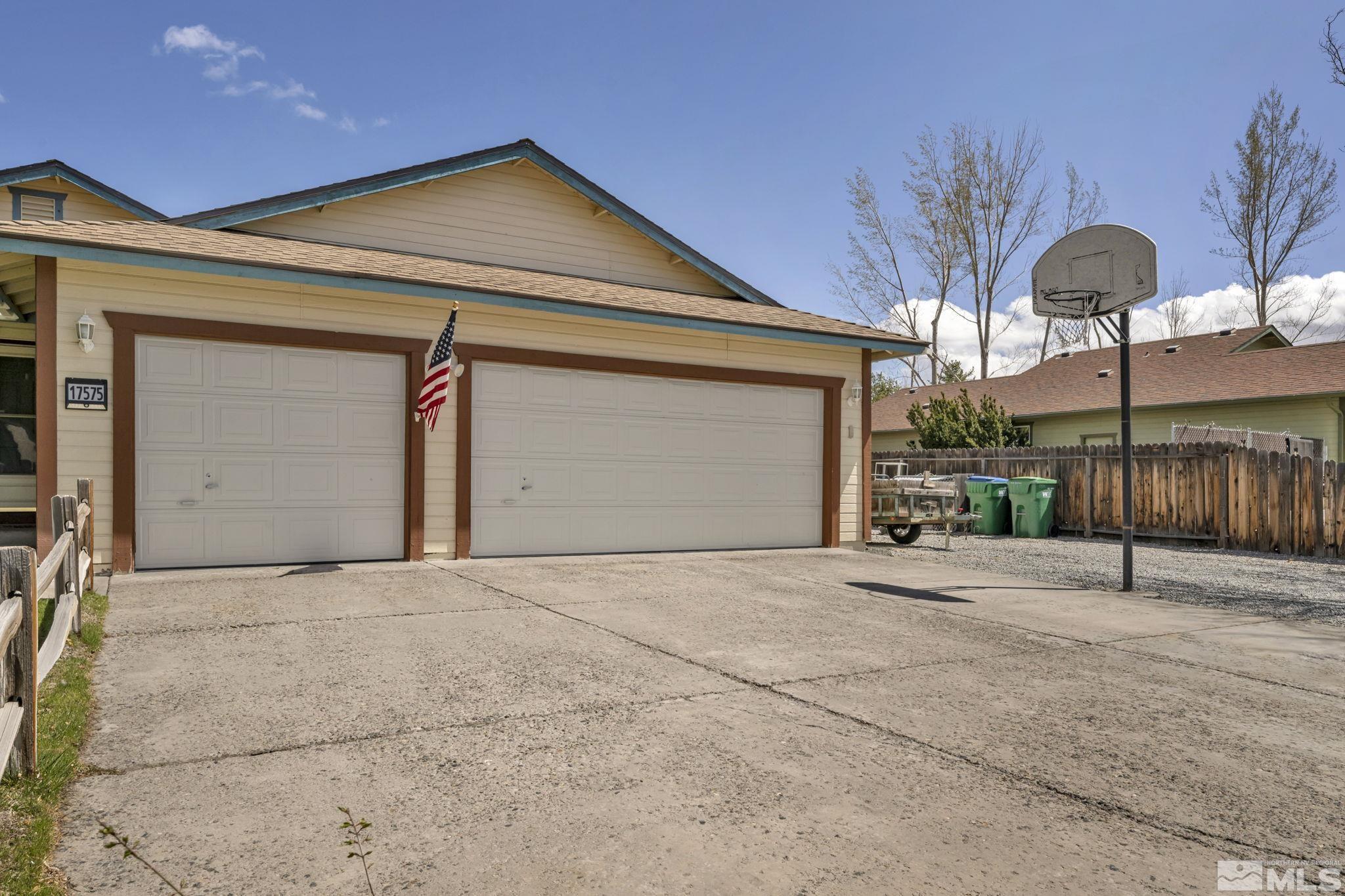 17575 Blackbird Drive Reno, NV 89508 - Photo 3 of 29 a front view of a house with a garage