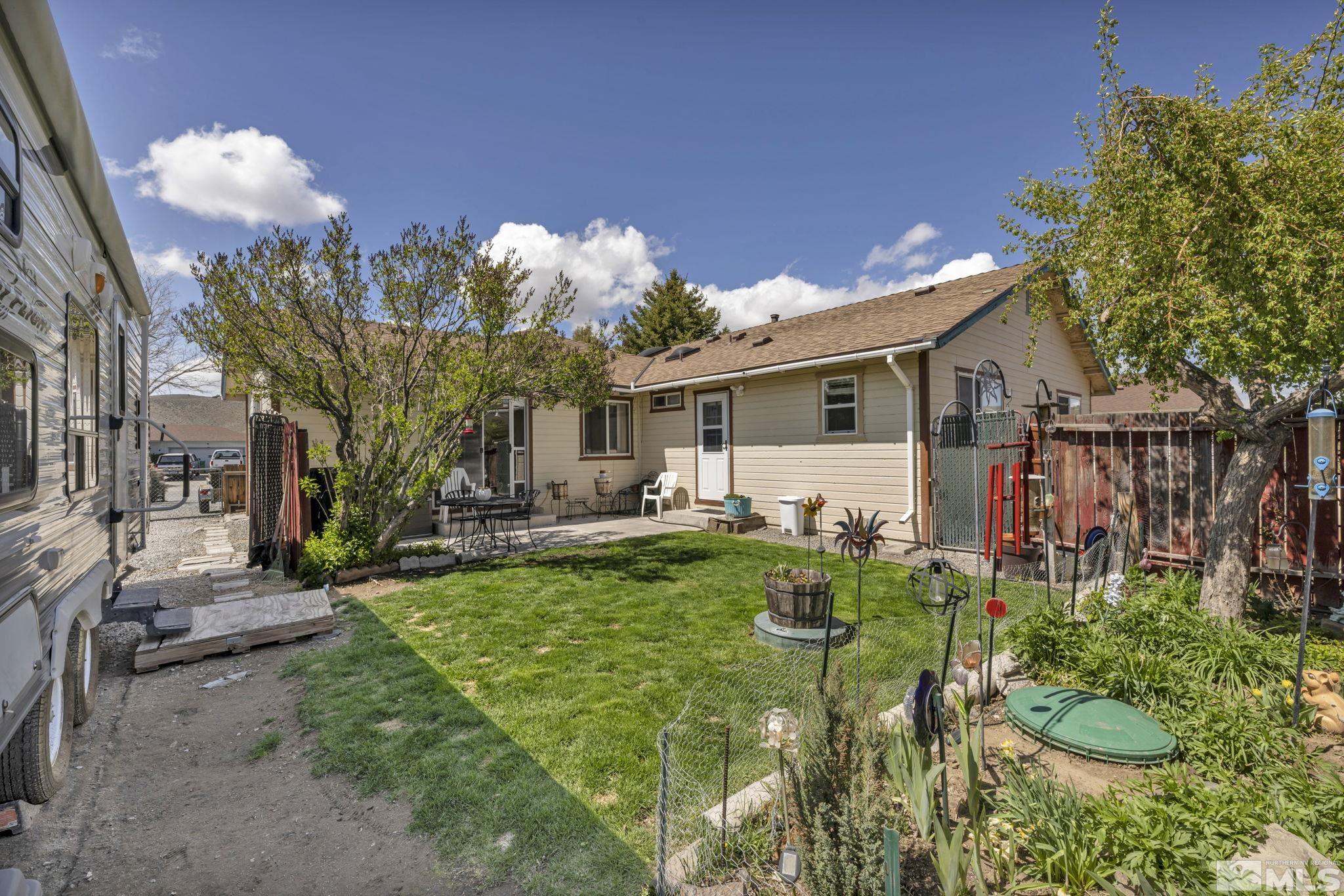 17575 Blackbird Drive Reno, NV 89508 - Photo 6 of 29 a view of a house with backyard and sitting area