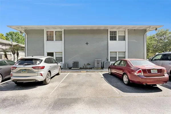 a car parked in front of a house