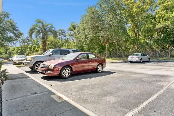 a view of a car parked in front of a house