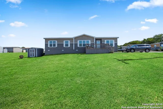 a house view with a garden space