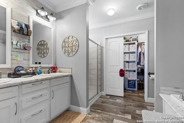 a bedroom with toys and a chandelier