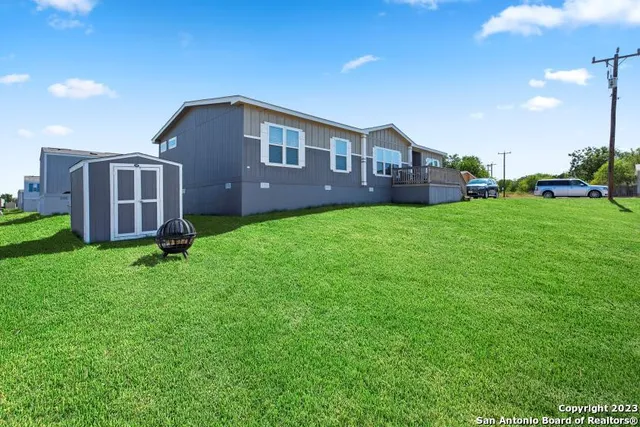 a house view with a garden space