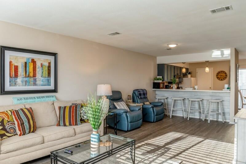 60 Sandprints Drive, Unit D2 Miramar Beach, FL 32550 - Photo 1 of 26 a living room with furniture and a view of kitchen