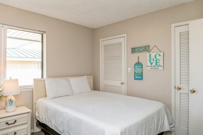 60 Sandprints Drive, Unit D2 Miramar Beach, FL 32550 - Photo 12 of 26 a bedroom with bed and window