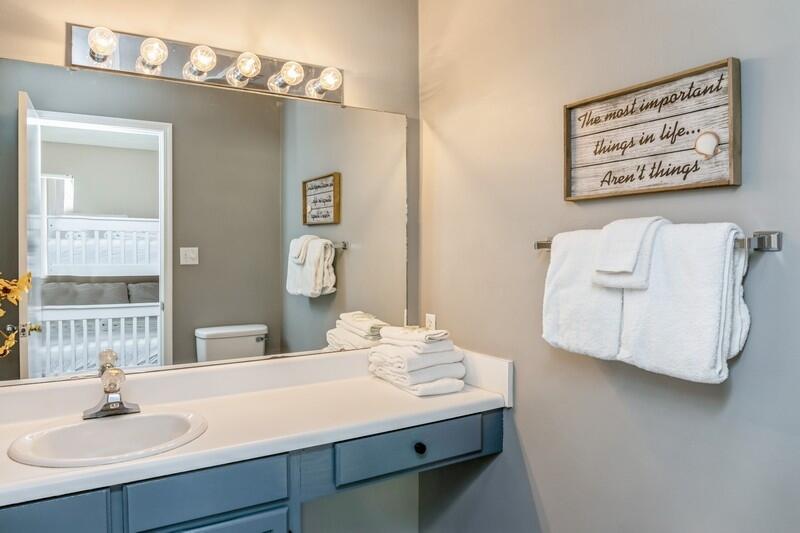 60 Sandprints Drive, Unit D2 Miramar Beach, FL 32550 - Photo 13 of 26 a bathroom with a sink and a mirror