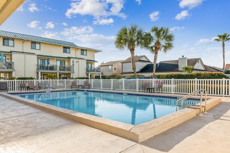 60 Sandprints Drive, Unit D2 Miramar Beach, FL 32550 - Photo 22 of 26 a view of a swimming pool with a lounge chair