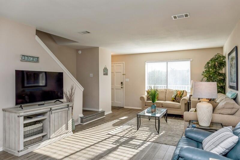 60 Sandprints Drive, Unit D2 Miramar Beach, FL 32550 - Photo 3 of 26 a living room with furniture and a flat screen tv
