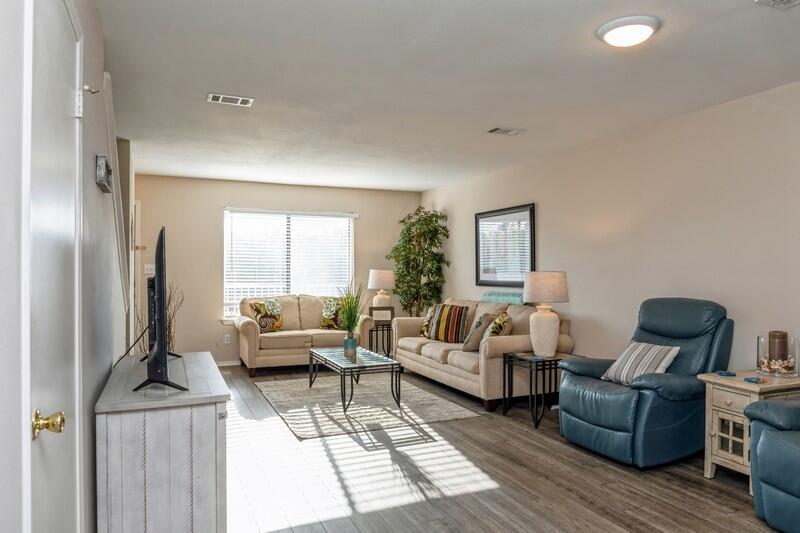 60 Sandprints Drive, Unit D2 Miramar Beach, FL 32550 - Photo 4 of 26 a living room with furniture and a window