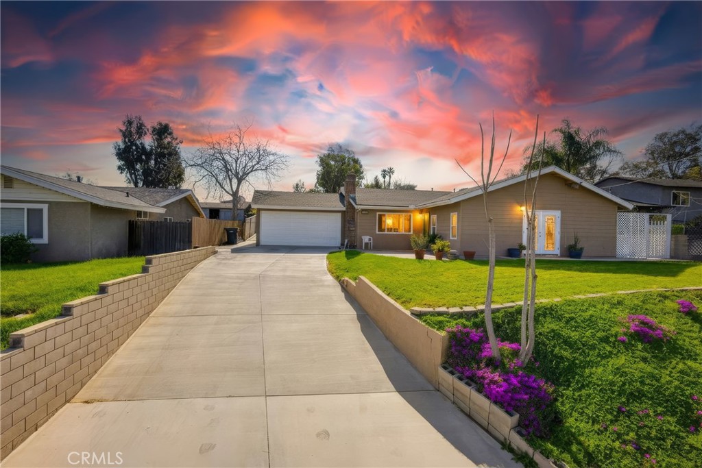 1090 Fourth Street Norco, CA 92860 - Photo 1 of 21 a view of house with a yard and potted plants