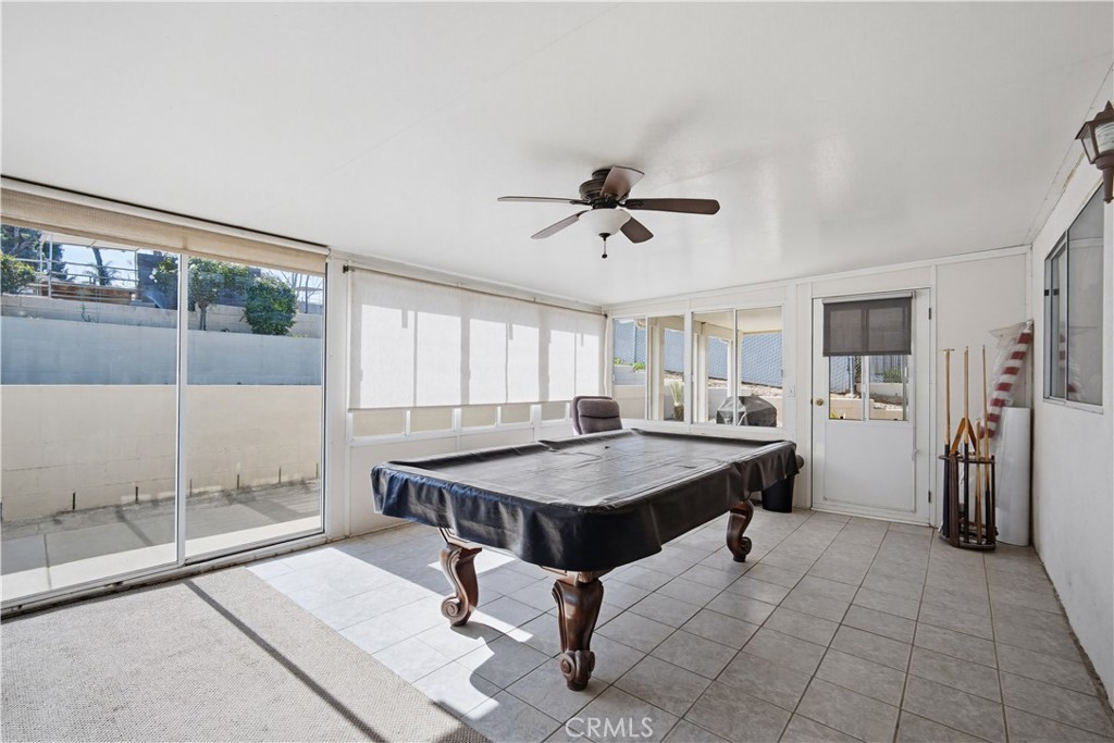 1090 Fourth Street Norco, CA 92860 - Photo 15 of 21 a room with gym equipment and wooden floor