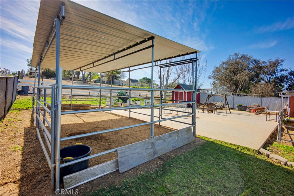 1090 Fourth Street Norco, CA 92860 - Photo 18 of 21 a view of a backyard with swimming pool