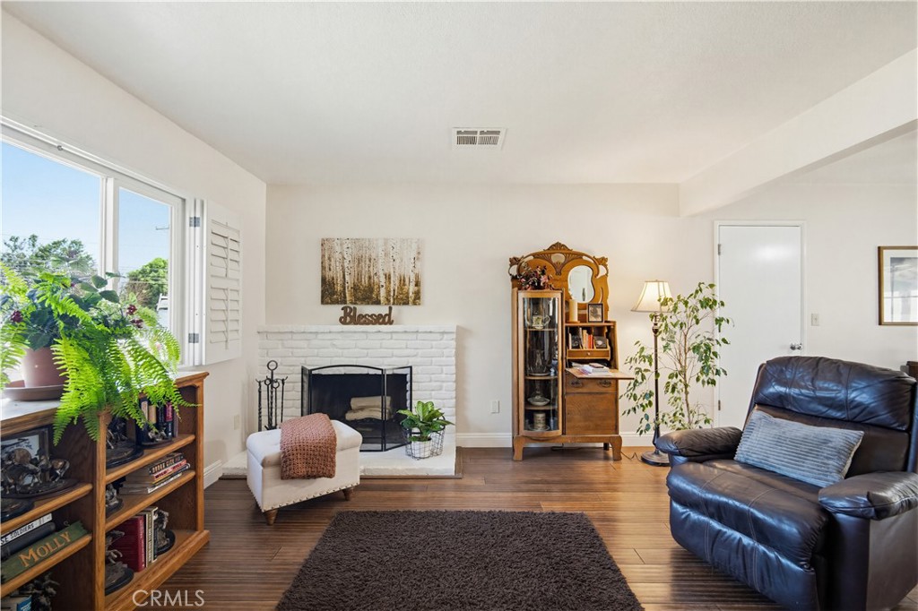 1090 Fourth Street Norco, CA 92860 - Photo 5 of 21 a living room with furniture and a fireplace