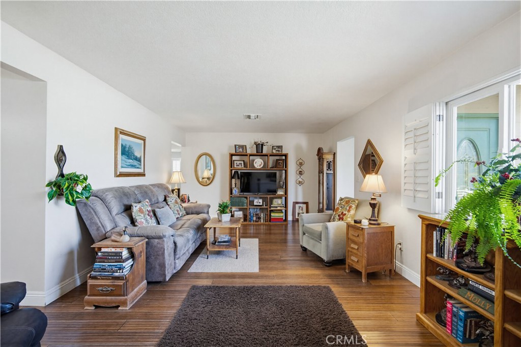 1090 Fourth Street Norco, CA 92860 - Photo 6 of 21 a living room with furniture and a fireplace