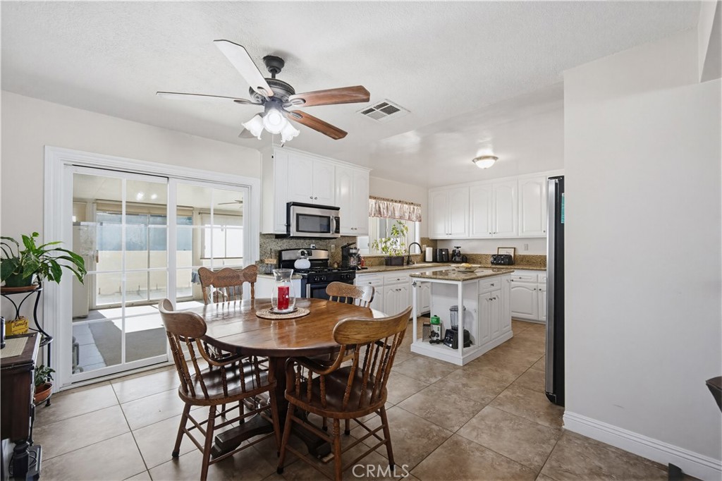 1090 Fourth Street Norco, CA 92860 - Photo 7 of 21 a dining room with furniture and window