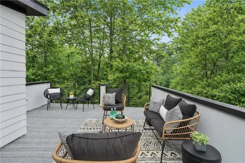 a outdoor living space with furniture and garden
