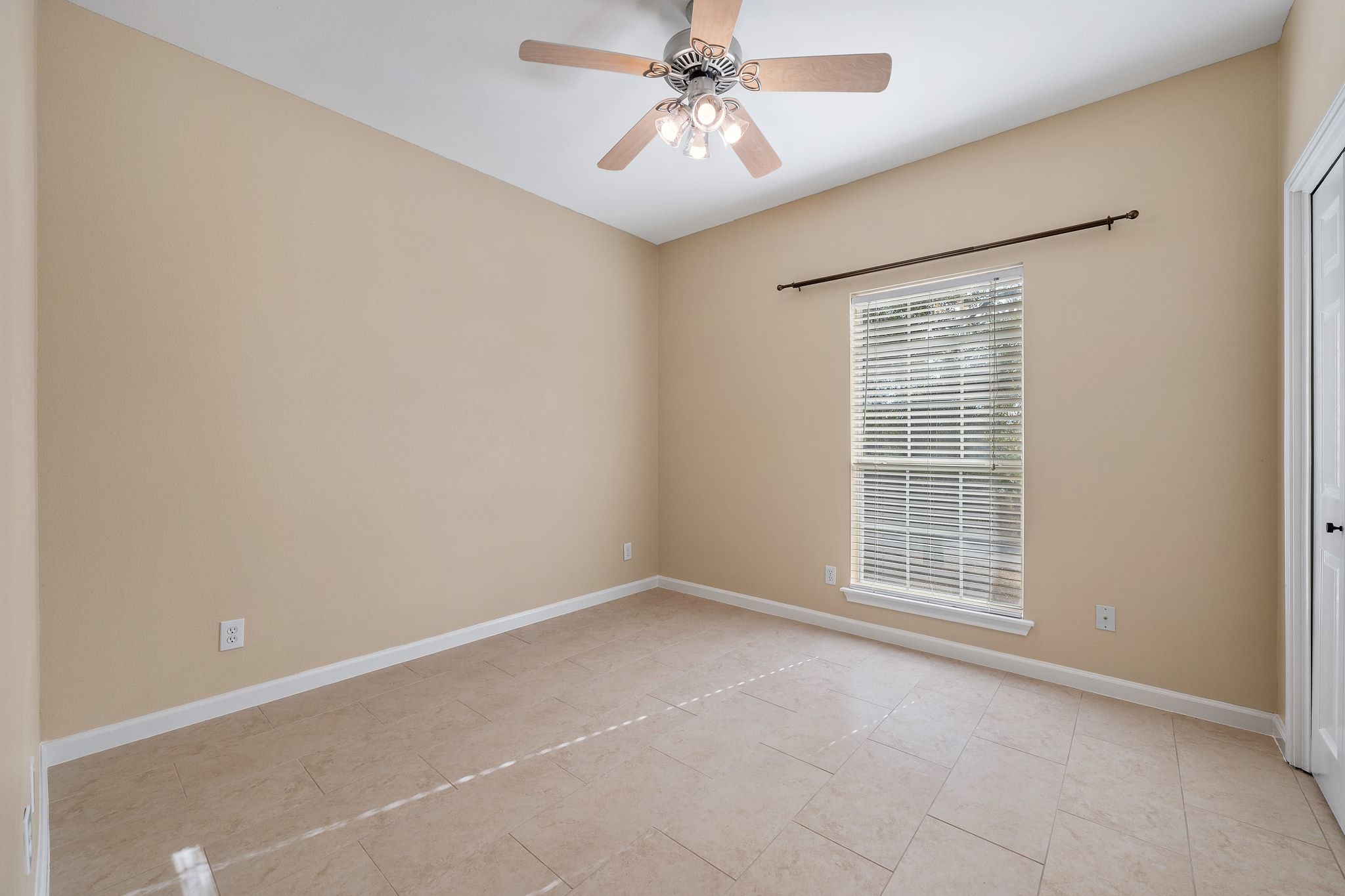 3139 Chisholm Trail Austin, TX 78734 - Photo 29 of 37 Unfurnished room featuring ceiling fan and baseboards