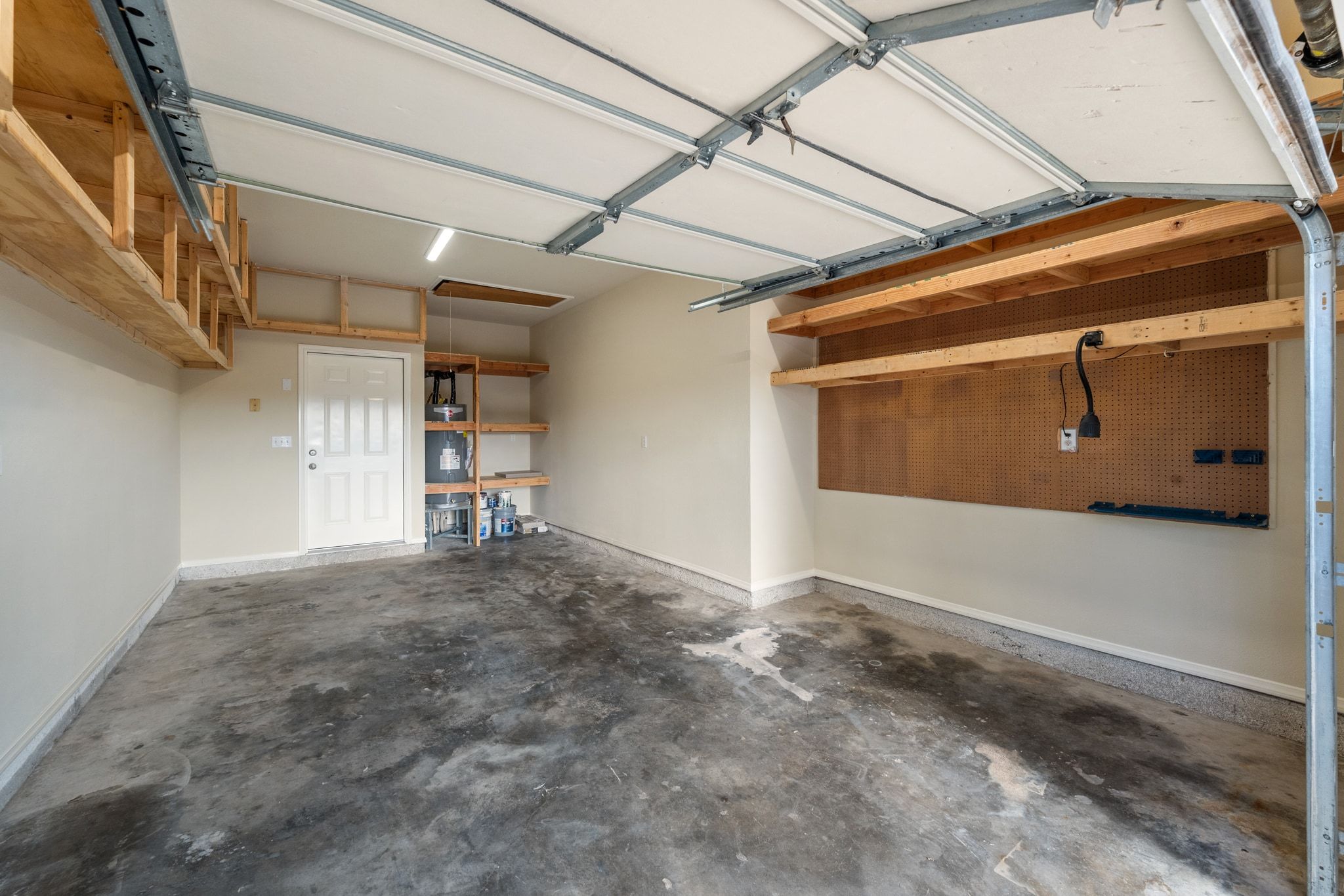 3139 Chisholm Trail Austin, TX 78734 - Photo 32 of 37 Garage with baseboards