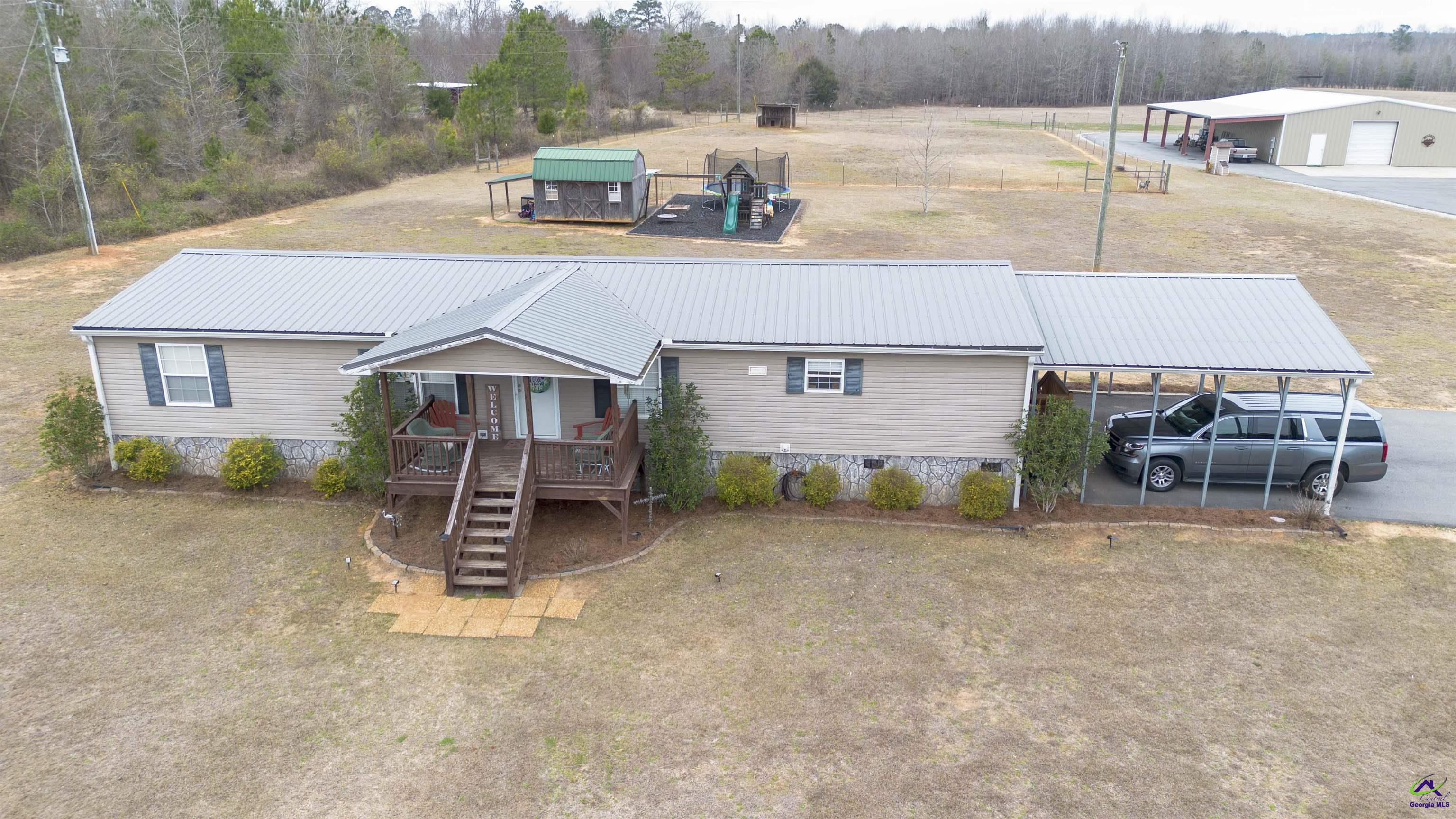 500 Old Milledgeville Road Cochran, GA 31014 - Photo 24 of 48 a house view with a outdoor space