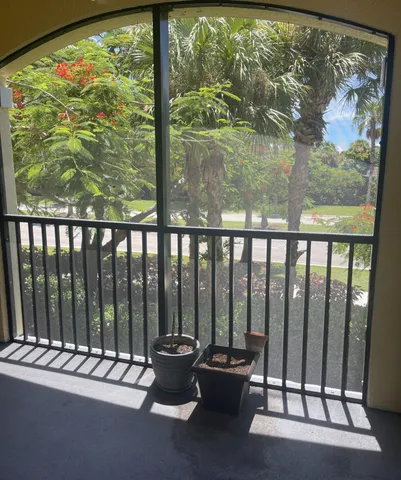 a balcony with chairs
