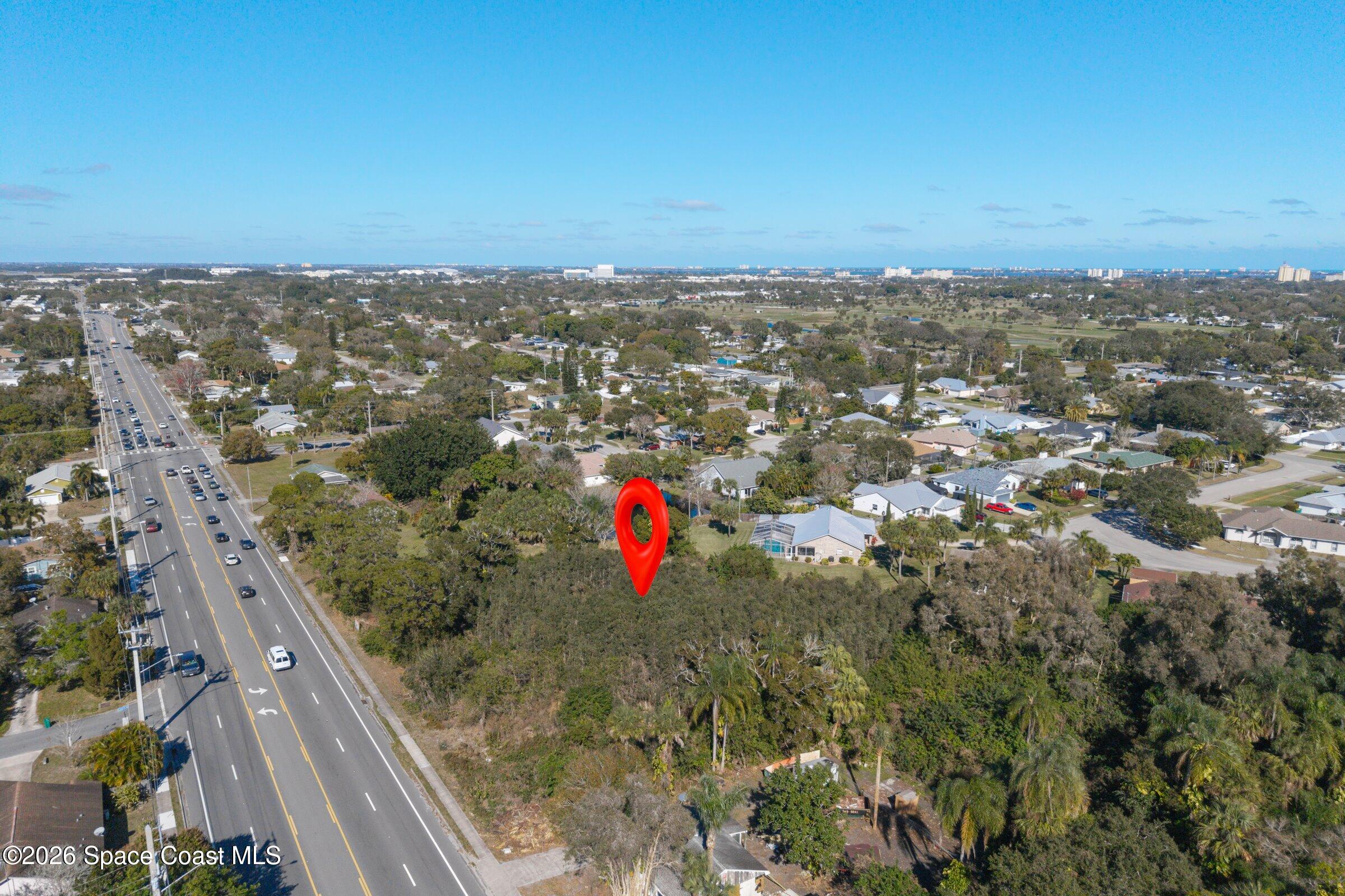 2561 Dairy Road Melbourne, FL 32904 - Photo 5 of 8 an aerial view of city