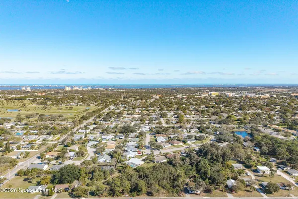 an aerial view of residential space with city view