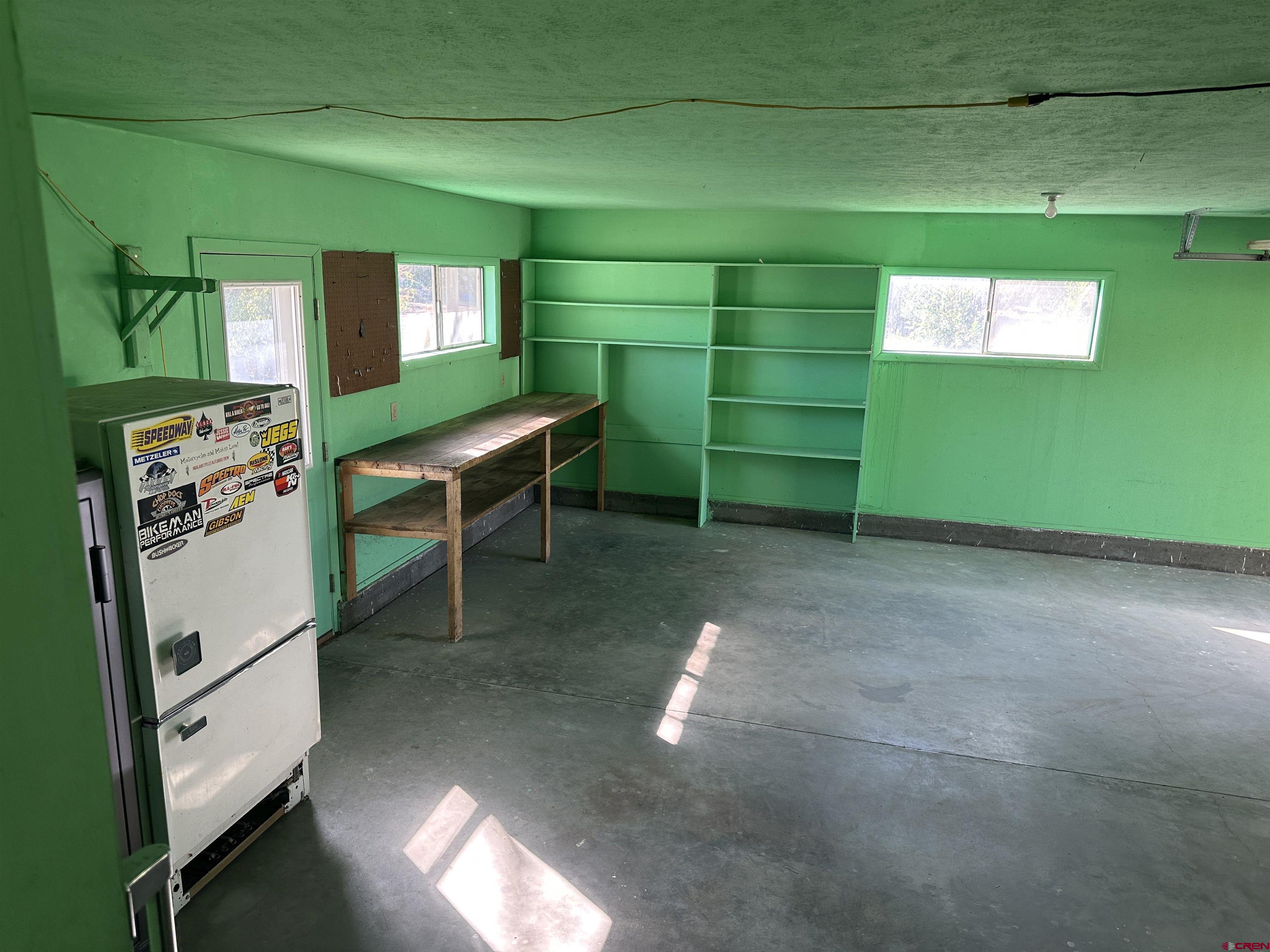1090 Cloverleaf Lane Delta, CO 81416 - Photo 16 of 30 a room with furniture and a window