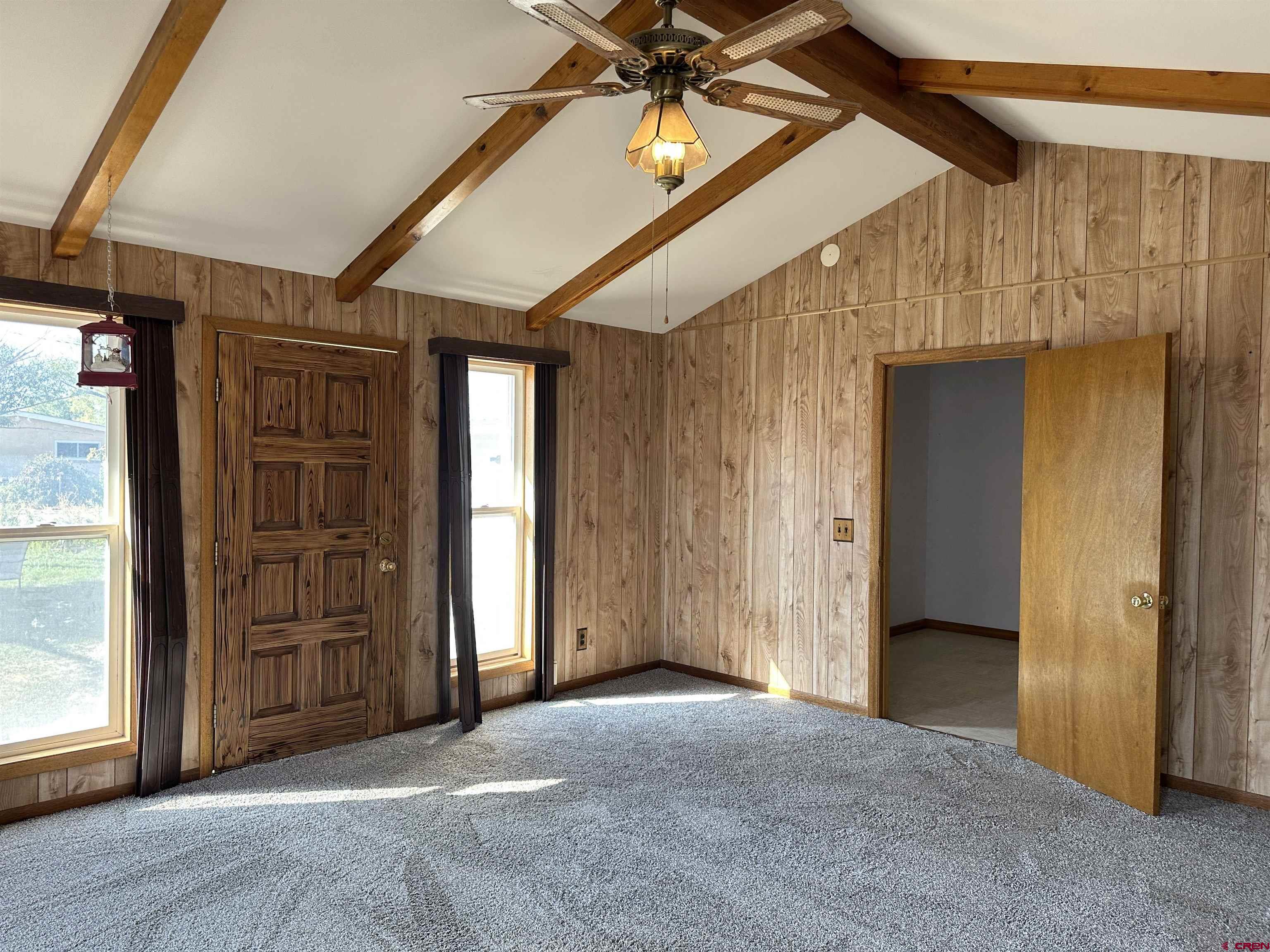 1090 Cloverleaf Lane Delta, CO 81416 - Photo 18 of 30 a view of a hallway with wooden floor and entryway
