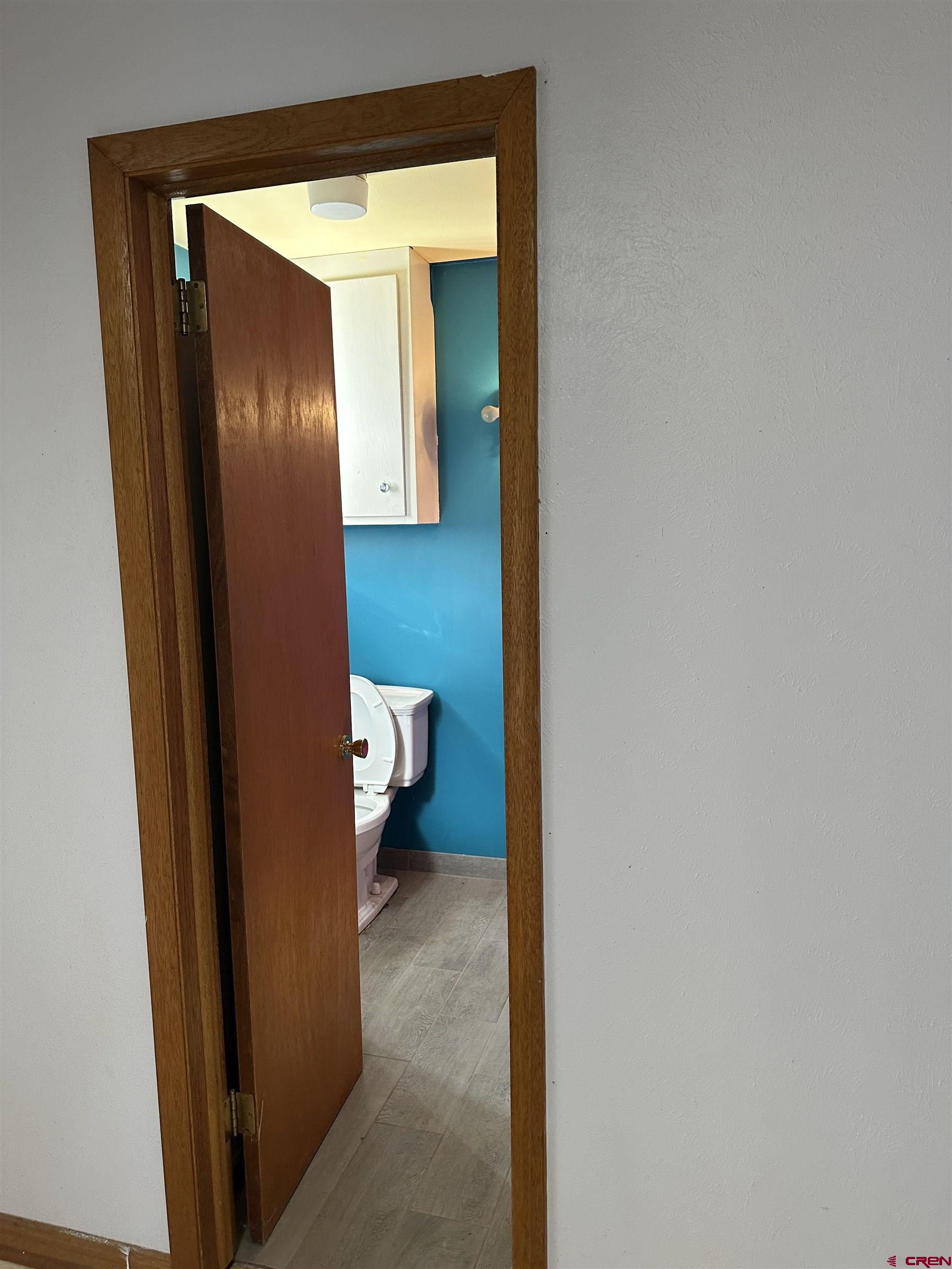 1090 Cloverleaf Lane Delta, CO 81416 - Photo 3 of 30 a view of a bathroom from a hallway