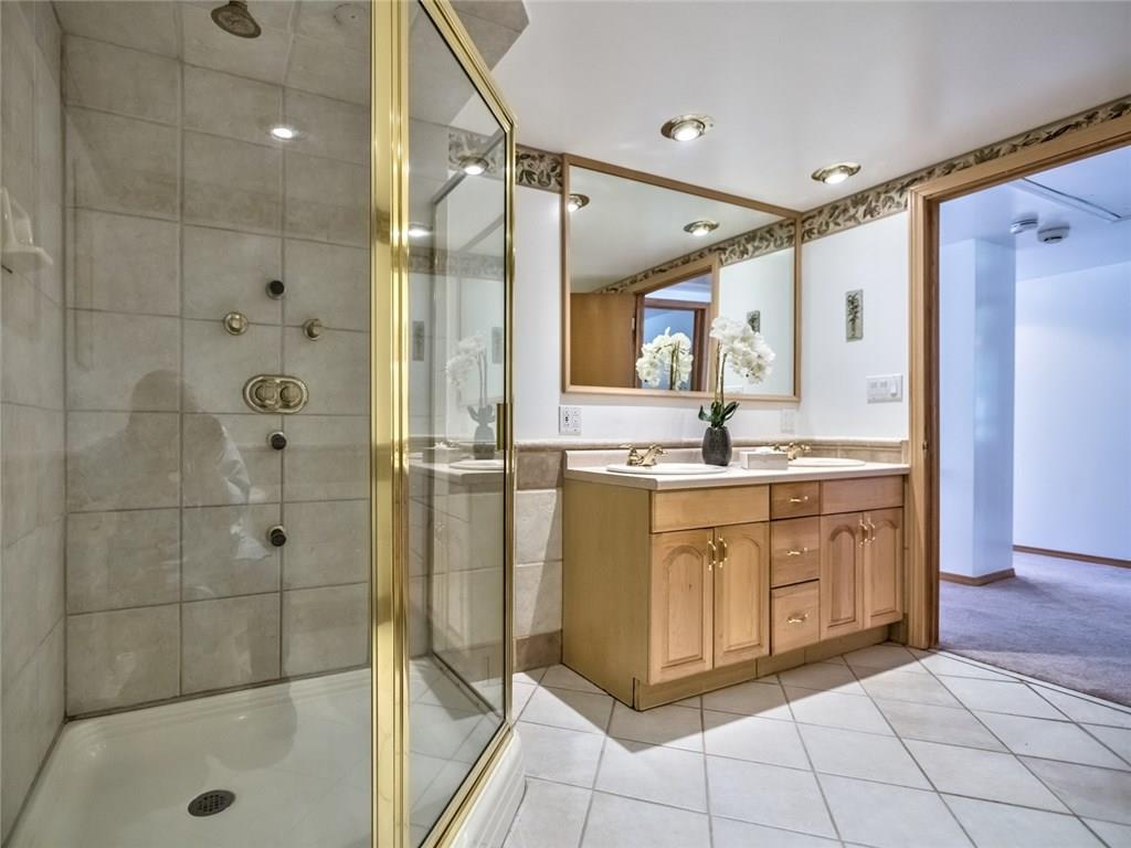 1524 Anderson Road Pittsburgh, PA 15209 - Photo 15 of 25 a bathroom with a granite countertop sink mirror and shower