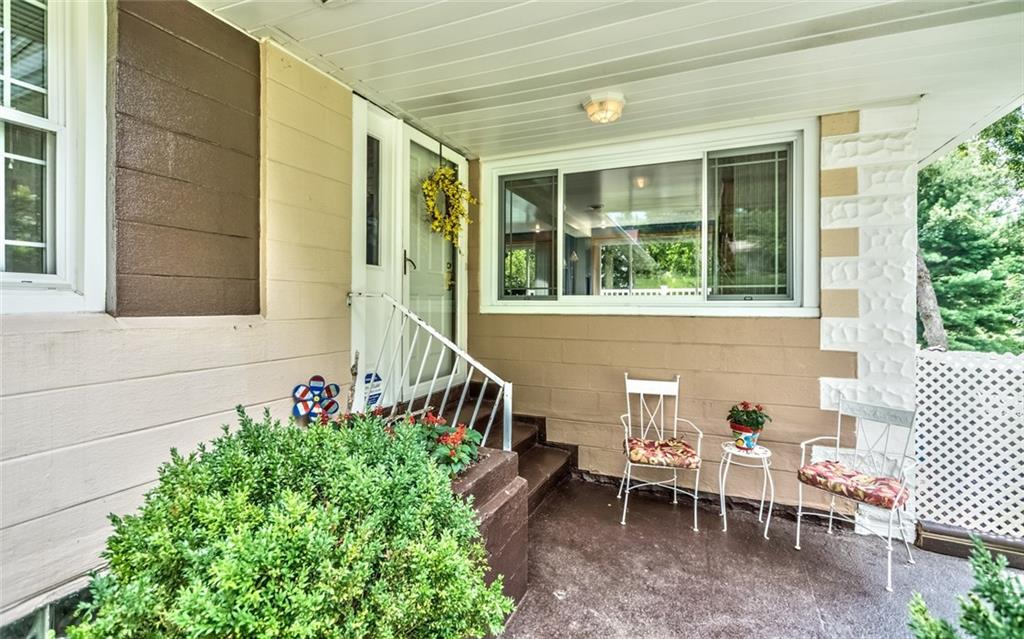 1524 Anderson Road Pittsburgh, PA 15209 - Photo 2 of 25 a view of a patio with table and chairs and potted plants