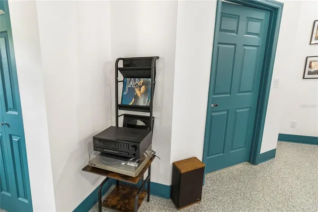 a bedroom with a bed and a closet