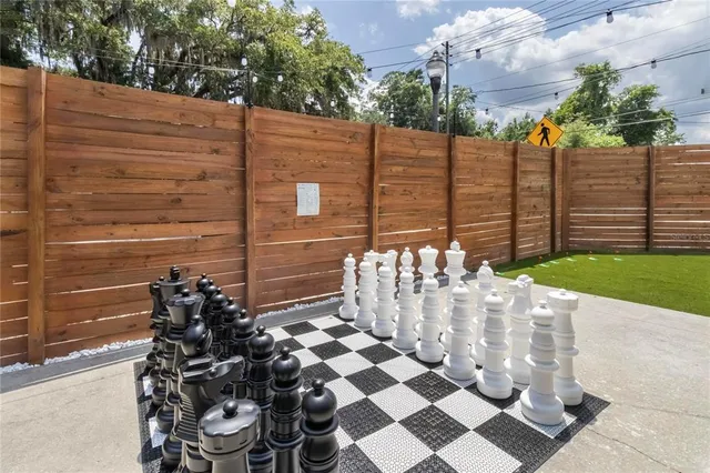 a view of a chairs and table in the patio