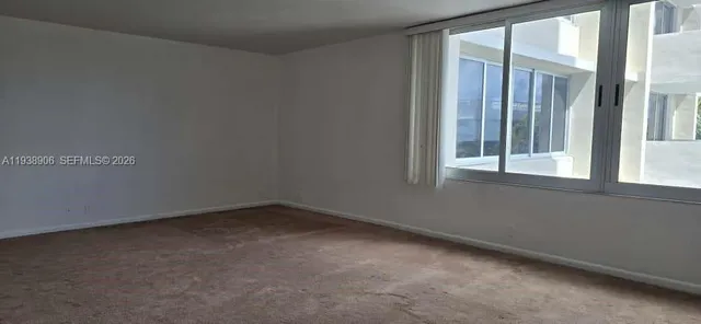a view of a balcony with a potted plant