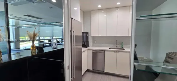 a outdoor space with furniture and large windows