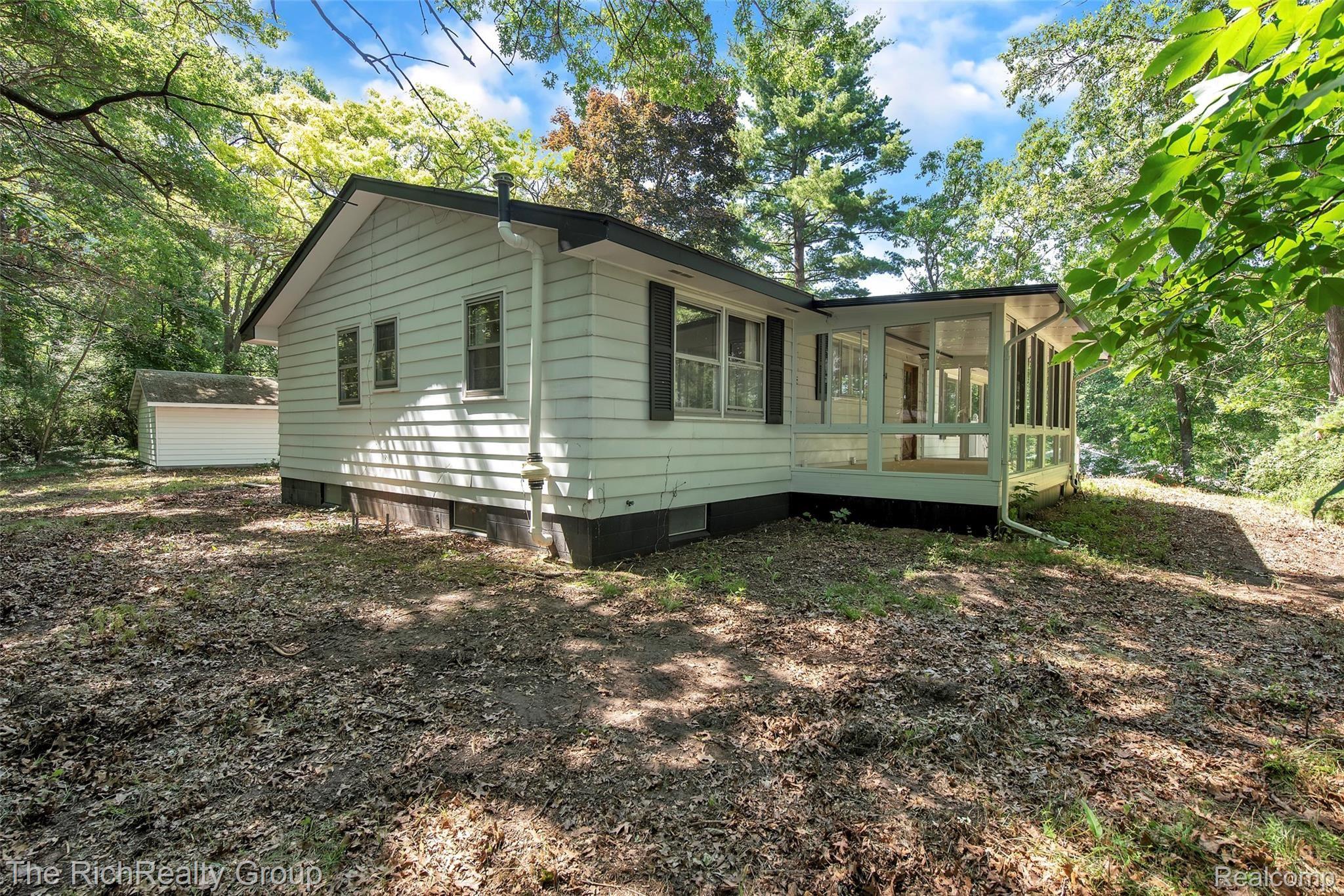 8822 River Valley Road Brighton, MI 48116 - Photo 35 of 44 8822-River-Valley-Rd-Brighton-MI-48116-windowstill-35.jpg